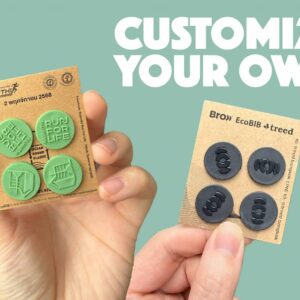 กระดุมติด BIB วิ่ง ผลิตจาก พลาสติกรีไซเคิล OBP (ขยะทะเล) โดย โรงงานฉีดพลาสติก เน้นความยั่งยืน